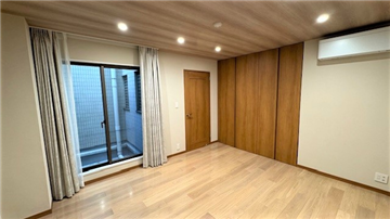 約9畳の洋室／入口側を撮影