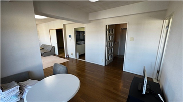 リビングダイニング/キッチン方向を撮影