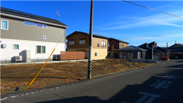 東側前面道路より敷地内(南東方向を撮影)