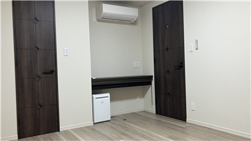 洋室/入口方向を撮影